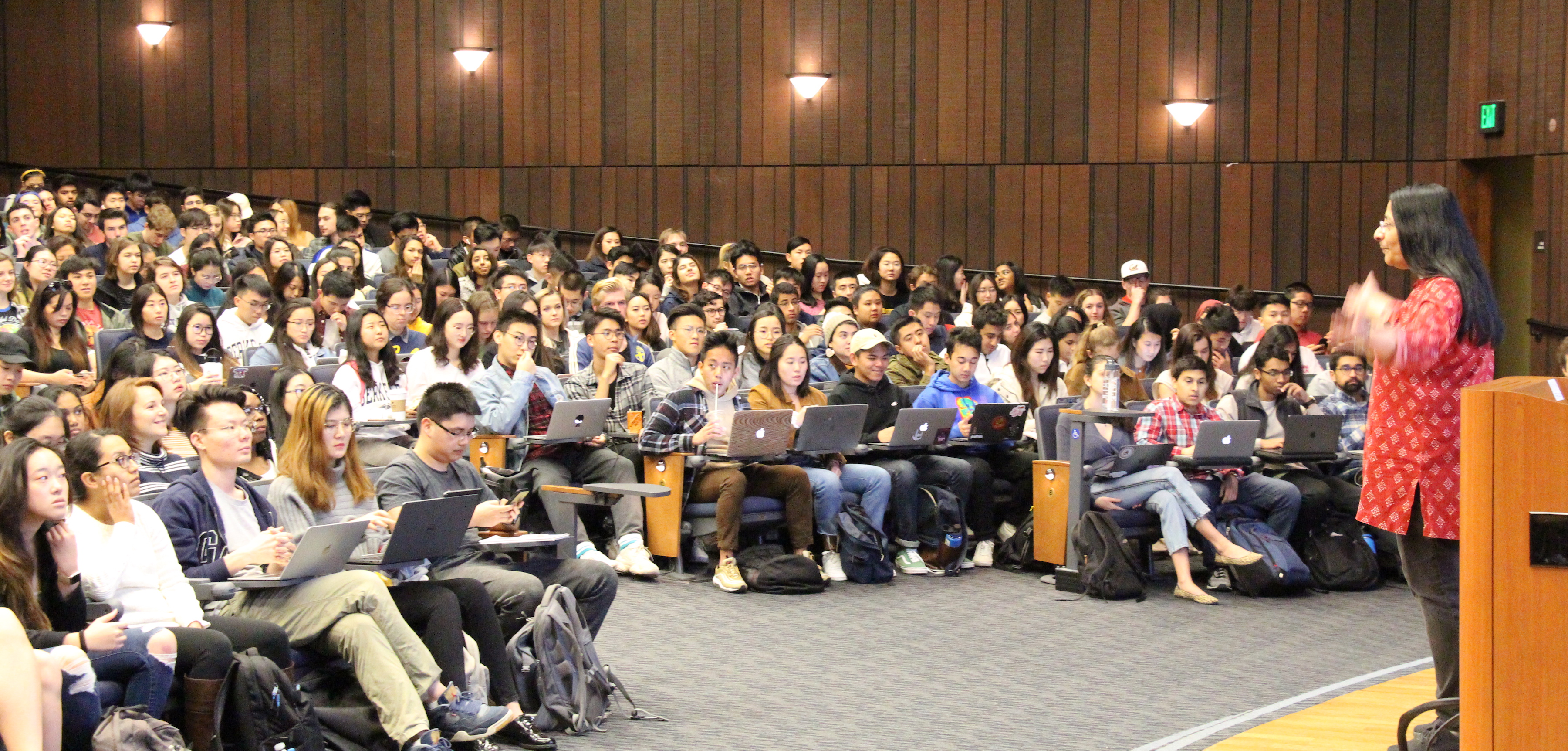 Lecturer speaking in front of classroom of data science students