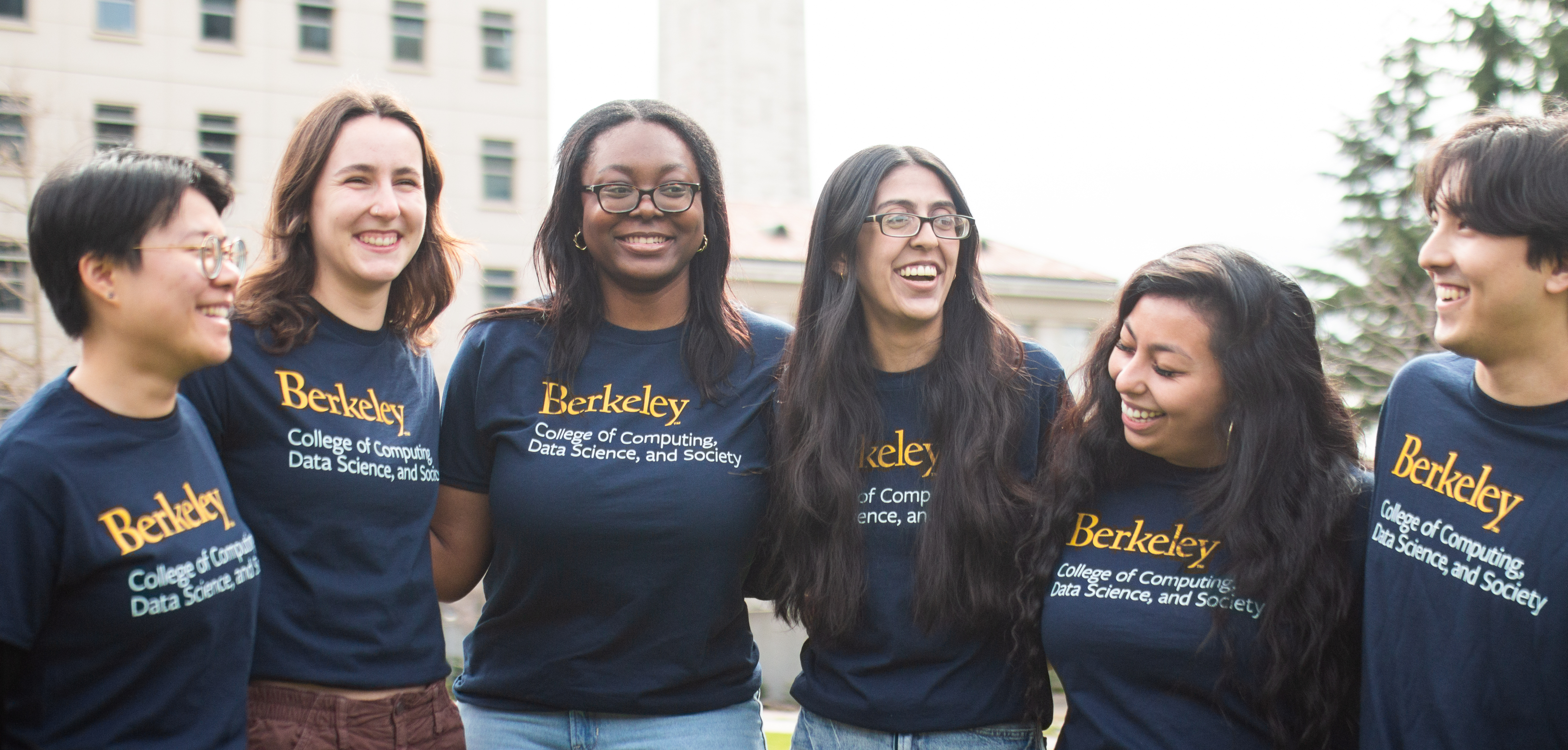 From left to right, Qian Ni, Ella Culleton, Orlyana Tantchou, Michelle Garcia Zamudio, Jennifer Ortega and Michael Florip in the UC Berkeley College of Computing, Data Science, and Society smile on Berkeley's campus this spring. 