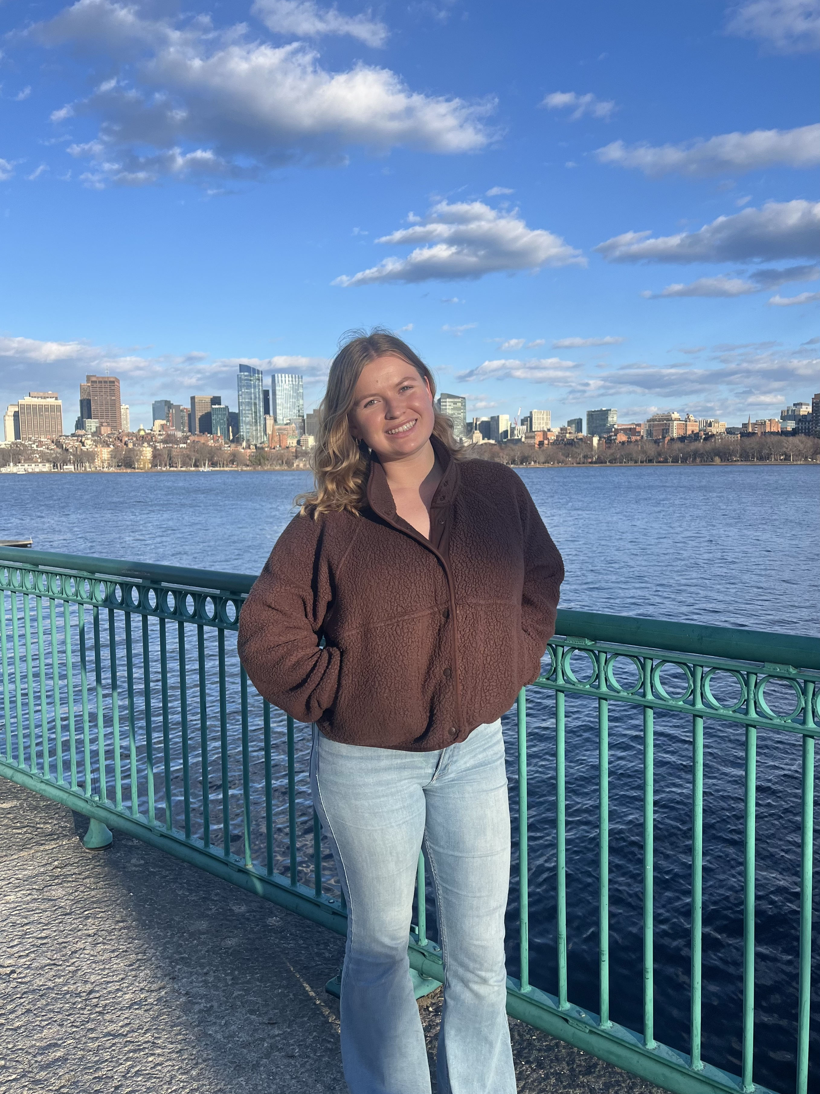 Data Science Peer Advisor, Anya, standing by a lake