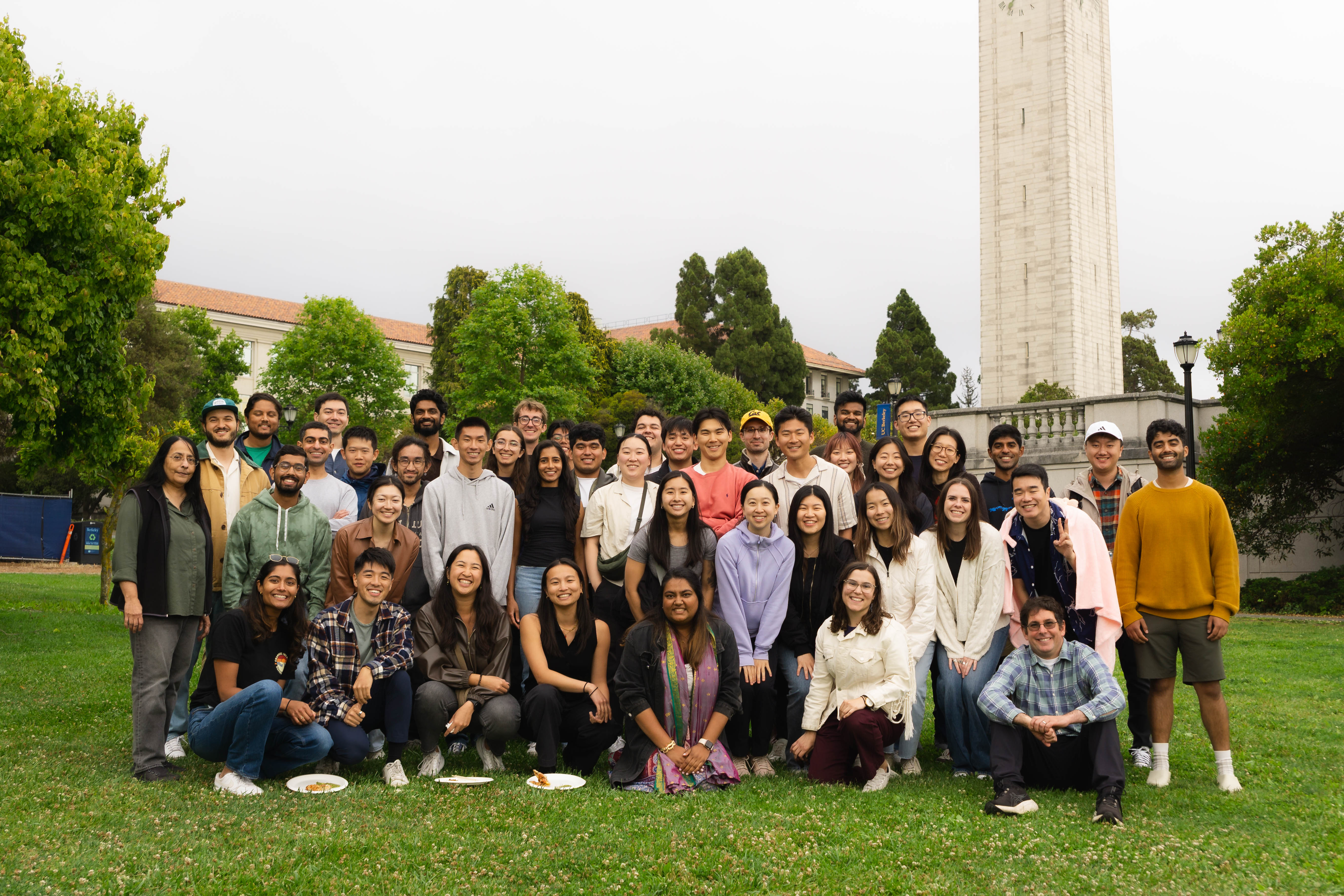 Data Science student instructors pose in a group on Memorial Glade at the 2025 reunion