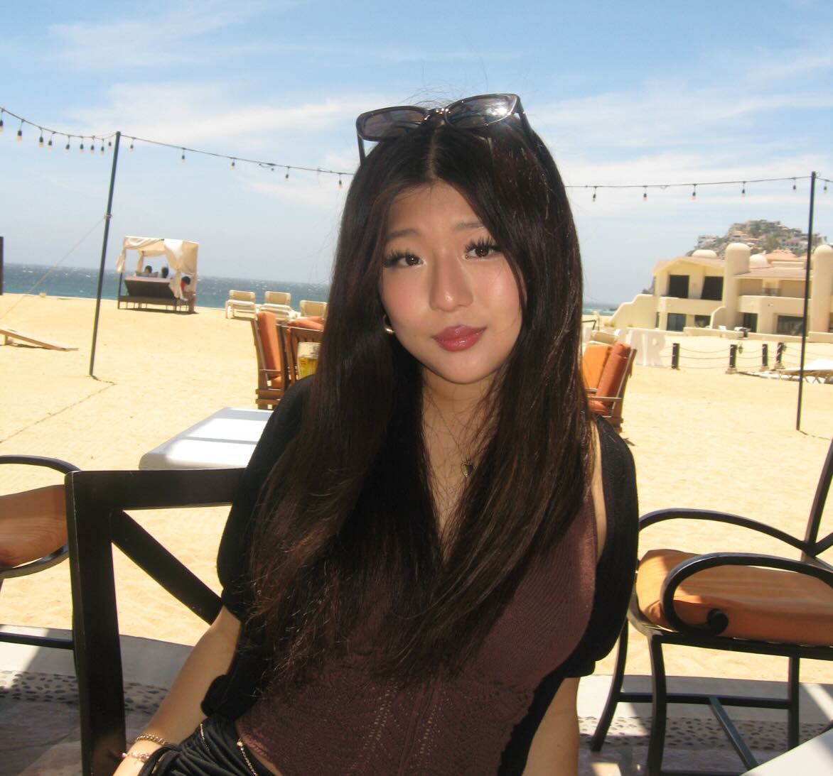 Kristin DSPA seated near the beach