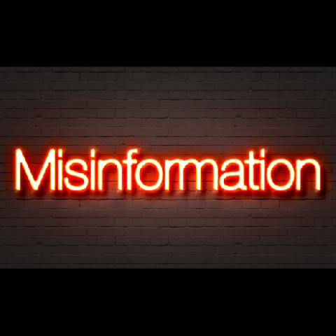 Neon red sign of the word "Misinformation" 