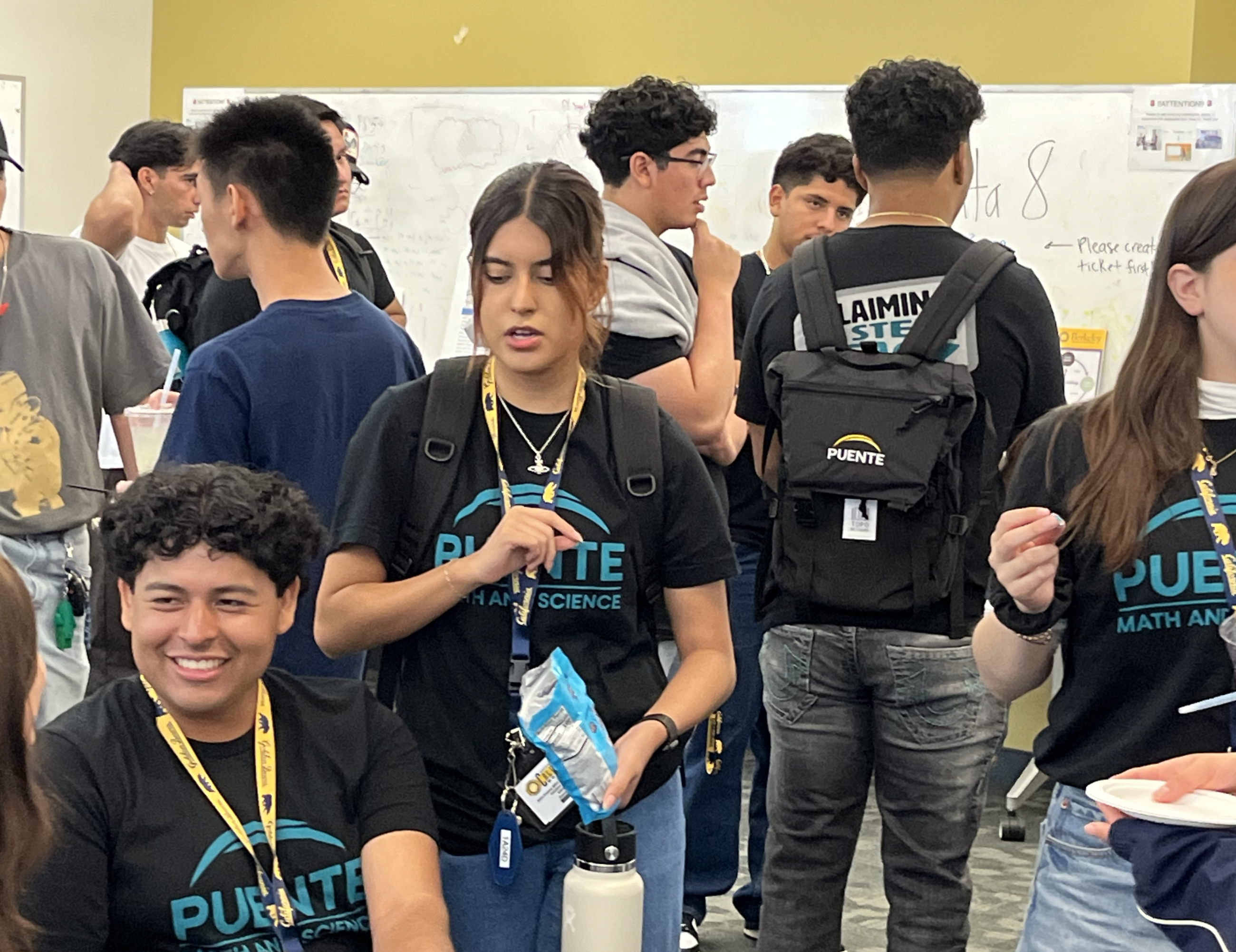 Puente students mingle with UC Berkeley undergraduates and panelists